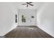 Bright and airy living room featuring hardwood floors, multiple windows, and a front door at 1226 Byewood Sw Ln, Atlanta, GA 30310