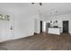 Open-concept living space with modern kitchen and entry door at 1226 Byewood Sw Ln, Atlanta, GA 30310