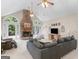 Spacious living room with vaulted ceiling, stone fireplace, and access to the deck at 507 N Green Cir, Mcdonough, GA 30252