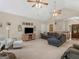Inviting living area with neutral tones, ceiling fan, and comfortable seating arrangement at 507 N Green Cir, Mcdonough, GA 30252