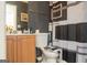 Cozy bathroom featuring a patterned shower curtain, wood-tone vanity, and ample lighting at 5639 Mallard Trl, Lithonia, GA 30058