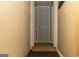 This hallway features neutral walls, white trim, and 6-panel doors at 5639 Mallard Trl, Lithonia, GA 30058