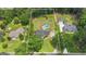 Aerial view of the property with marked lot lines, showcasing the home's location and surrounding landscape at 140 Laurel Lake Rd, Tyrone, GA 30290