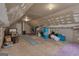 Spacious unfinished attic with natural light, offering potential for storage or conversion into a living space at 140 Laurel Lake Rd, Tyrone, GA 30290