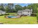 This home features an in-ground pool and deck area, perfect for outdoor entertaining at 140 Laurel Lake Rd, Tyrone, GA 30290