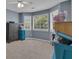The bedroom features three large windows offering great light and space for storage at 140 Laurel Lake Rd, Tyrone, GA 30290