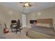 Bedroom with ceiling fan, natural light, and perfect for study or hobbies at 140 Laurel Lake Rd, Tyrone, GA 30290