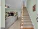 Foyer with stairs leading to the upper level and flows into the living room at 140 Laurel Lake Rd, Tyrone, GA 30290