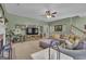 Living room with a fireplace, entertainment center, and comfortable seating at 140 Laurel Lake Rd, Tyrone, GA 30290