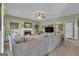 Spacious living room with a fireplace, TV, and large sofa for relaxing at 140 Laurel Lake Rd, Tyrone, GA 30290