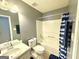 Clean bathroom with a shower-tub combination and a single sink vanity at 6638 Creek Turn Dr, Rex, GA 30273
