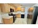 Well-equipped kitchen with modern appliances, wood cabinets, and ample counter space at 6638 Creek Turn Dr, Rex, GA 30273