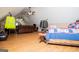Comfortable attic space, featuring hardwood floors, and bedroom setting at 385 Liberty Church Rd, Carrollton, GA 30116
