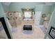 Spacious bathroom featuring separate shower and tub, with tile floors and walls at 385 Liberty Church Rd, Carrollton, GA 30116