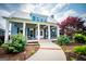 Inviting home showcasing a charming front porch and a walkway that leads to the front door at 385 Liberty Church Rd, Carrollton, GA 30116