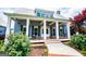 Welcoming home featuring a spacious front porch with rocking chairs and swing at 385 Liberty Church Rd, Carrollton, GA 30116