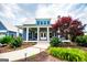 Beautiful home featuring a large front porch, landscaped garden, and a stone walkway at 385 Liberty Church Rd, Carrollton, GA 30116
