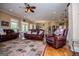 Comfortable living room with leather furniture, fireplace, and open layout at 385 Liberty Church Rd, Carrollton, GA 30116