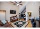 Inviting living room with high ceilings, leather furniture, and an open layout at 385 Liberty Church Rd, Carrollton, GA 30116