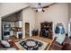 Comfortable living room with a desk and kitchen, under a high ceiling with ceiling fan at 385 Liberty Church Rd, Carrollton, GA 30116