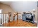 This is an office with hardwood floors and a stairway leading up to it at 385 Liberty Church Rd, Carrollton, GA 30116