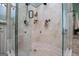 This is a shower with tile floors and walls and multiple shower heads at 385 Liberty Church Rd, Carrollton, GA 30116