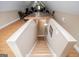 Staircase leading to an attic with hardwood floors, offering potential for additional living space at 385 Liberty Church Rd, Carrollton, GA 30116
