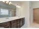 Bathroom featuring double vanity, large mirror and marble floors at 35 Fraser Ln # 123B, Auburn, GA 30011
