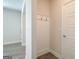 Hallway featuring wall hooks and wood-look flooring at 35 Fraser Ln # 123B, Auburn, GA 30011