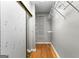 Walk-in closet with sliding door and built-in shelving and storage at 205 N Strathmore Dr, Sharpsburg, GA 30277
