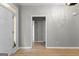 Welcoming entryway with natural light and an open transition to the living spaces at 205 N Strathmore Dr, Sharpsburg, GA 30277