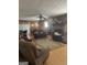 Spacious living room with hardwood floors, brick fireplace and vintage ceiling fans at 2534 Highway 155 N, Mcdonough, GA 30252
