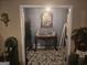 View of the entryway with decorative mirror and stylish mosaic tile floors at 1110 Hilburn Se Dr, Atlanta, GA 30316