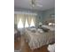 Bright main bedroom featuring hardwood floors, natural light, and ample space at 1110 Hilburn Se Dr, Atlanta, GA 30316