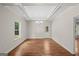 Dining area with coffered ceiling, chandelier, and hardwood floors at 55 Etheridge Rd, Temple, GA 30179