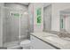 Main bathroom with glass shower, granite vanity, and tiled walls at 55 Etheridge Rd, Temple, GA 30179