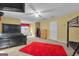 Bedroom with carpet, ceiling fan, bed, and window provides ample space at 15 Skipton Ct, Sharpsburg, GA 30277