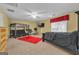 Large bedroom features a bed, bunkbeds, and carpet, ideal for children at 15 Skipton Ct, Sharpsburg, GA 30277