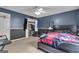 Spacious bedroom includes a ceiling fan, and a sizable closet with ample storage space at 15 Skipton Ct, Sharpsburg, GA 30277