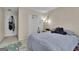 Relaxing bedroom with a comfortable bed, quirky rug, and ample closet space at 15 Skipton Ct, Sharpsburg, GA 30277
