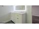 Bathroom vanity with double sinks and an illuminated mirror; spacious with wood look flooring at 2576 Abbotts Glen Nw Dr, Acworth, GA 30101