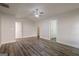 Large bedroom featuring a ceiling fan, vaulted ceiling, with ensuite bathroom and walk-in closet at 2576 Abbotts Glen Nw Dr, Acworth, GA 30101