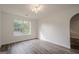 Cozy bedroom with hardwood floors and a bright window at 2576 Abbotts Glen Nw Dr, Acworth, GA 30101
