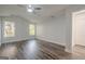 Spacious bedroom featuring a ceiling fan, vaulted ceiling, and multiple windows for natural light at 2576 Abbotts Glen Nw Dr, Acworth, GA 30101