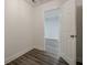 Hallway features a view to another room, neutral colors, and white trim at 2576 Abbotts Glen Nw Dr, Acworth, GA 30101
