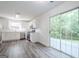 Bright kitchen features stainless appliances, sleek countertops, and sliding doors to the backyard at 2576 Abbotts Glen Nw Dr, Acworth, GA 30101