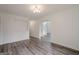 Open concept living room featuring hardwood floors and ample space at 2576 Abbotts Glen Nw Dr, Acworth, GA 30101