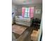 Charming bedroom with pink accents, a single bed, and a view of the outdoors at 517 Pebble Pt, Loganville, GA 30052