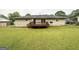 Spacious backyard with a wooden deck, perfect for outdoor entertaining and relaxation at 64 Gregory Ct, Dallas, GA 30157