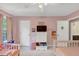 Bedroom includes twin beds, white dresser, windows, and ceiling fan at 1625 Clark Lake Nw, Acworth, GA 30102